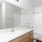 a bathroom with a large mirror
